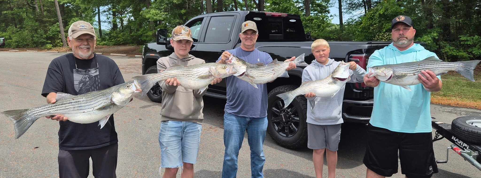 Group striper trip on the pontoon